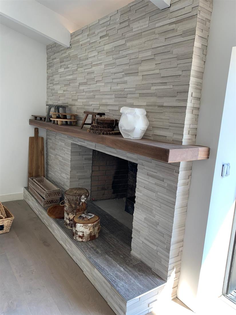 Stone veneer fireplace